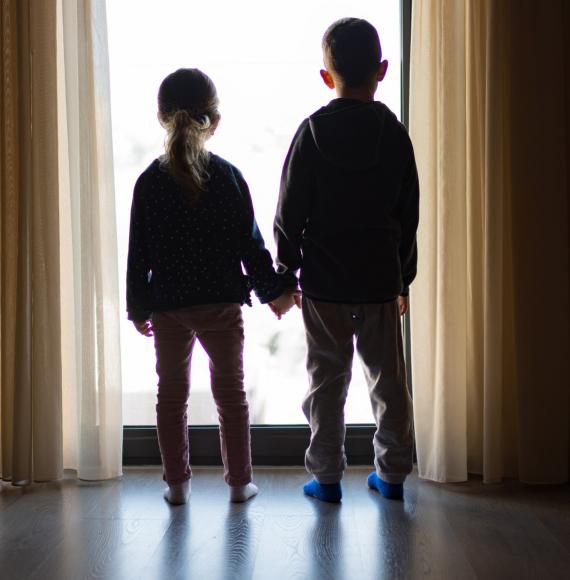 Children looking out the window 