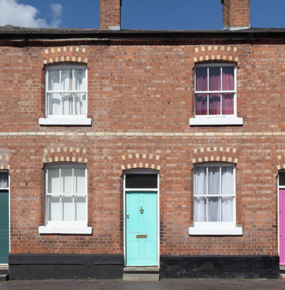 Terraced houses with multicoloured doors. 