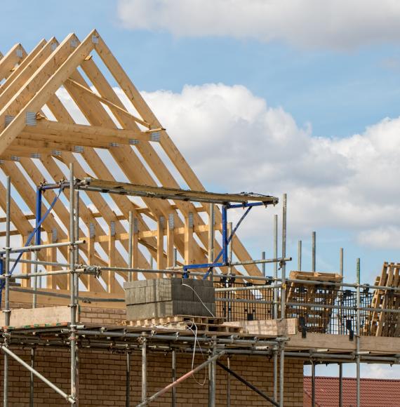 Houses being built on a construction site