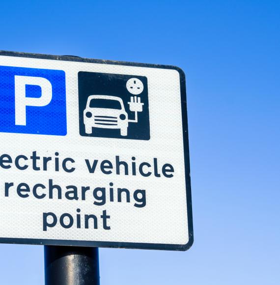 Electric vehicle charging sign