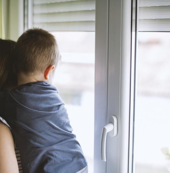 Woman holding boy