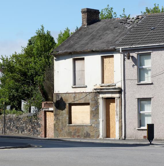 Boarded up house