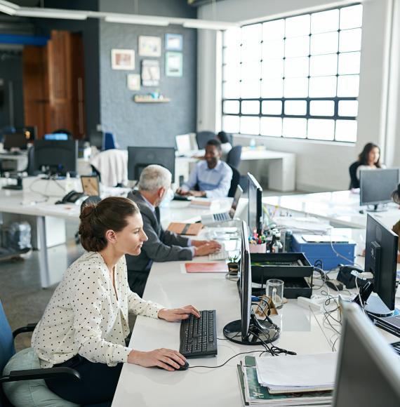 Office workers in an open plan space