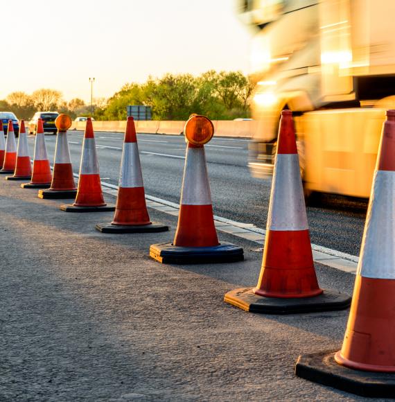 Traffic cones on the side of the road