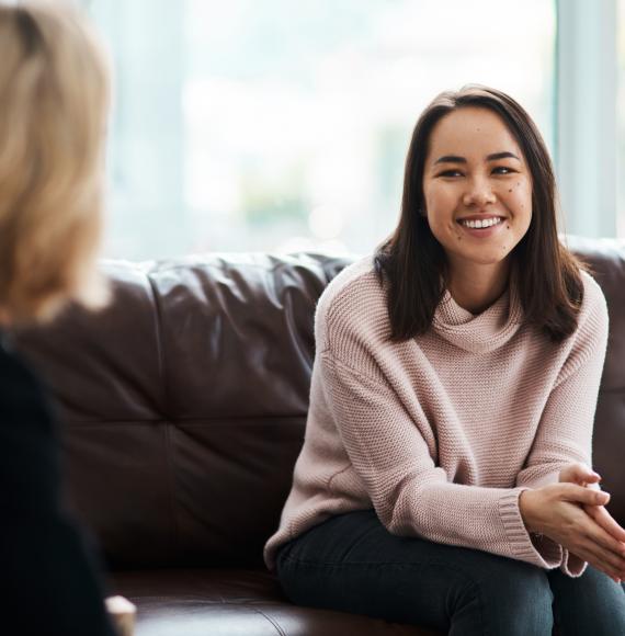 Woman speaking to mental health counsellor