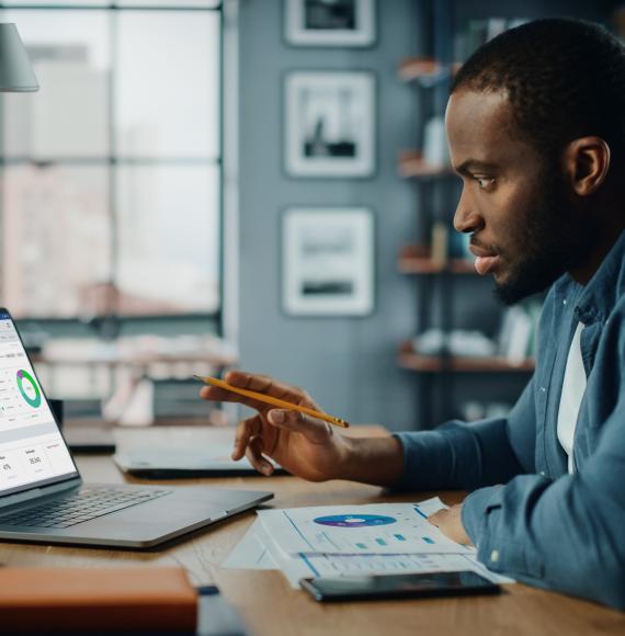 Man at a computer analysing data