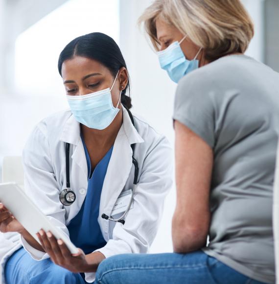 Health worker with woman