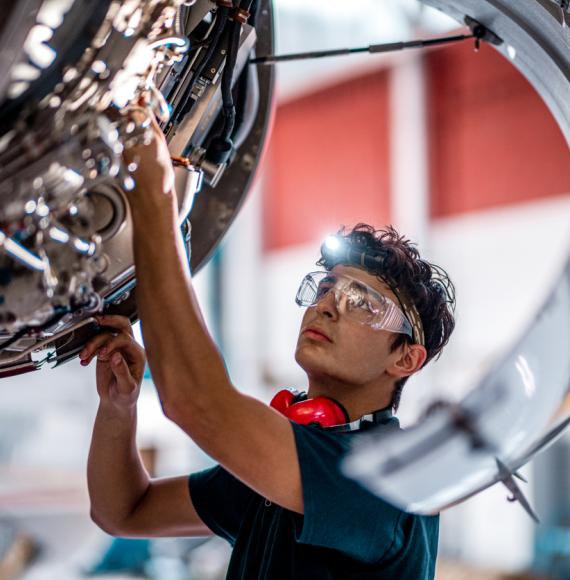 Male engineer working on an engine