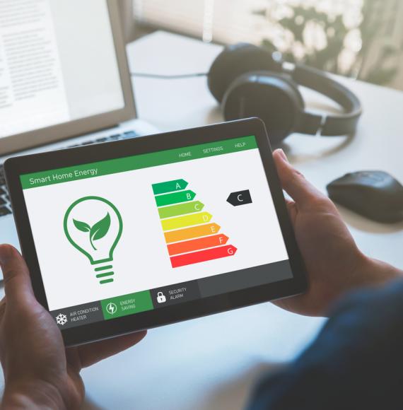 A tablet showing energy levels in a home