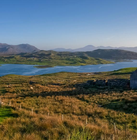 Rural Scottish village with lake in the background