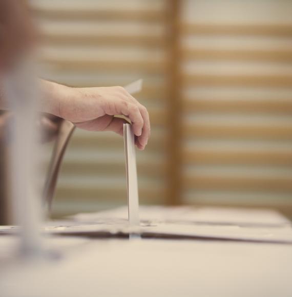 A person voting