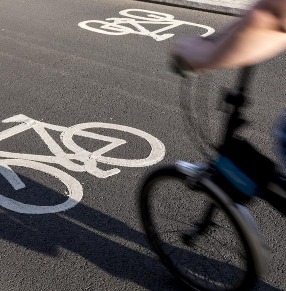 image of someone riding on a cycle path