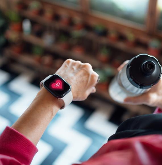 Woman looking at a smart watch