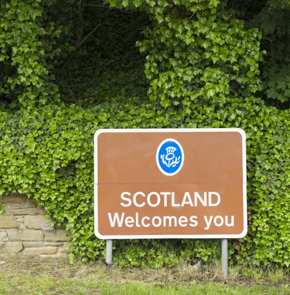 Road saying 'Scotland welcomes you'