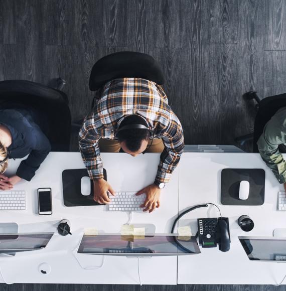 High angle shot of a group of people working in an office