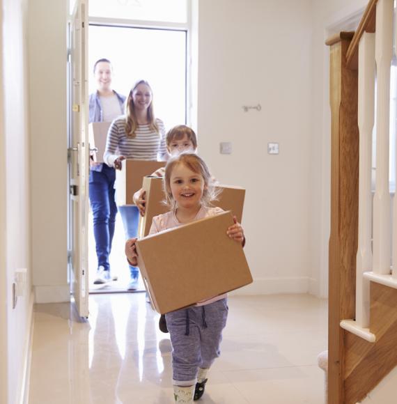 Family moving into a new home