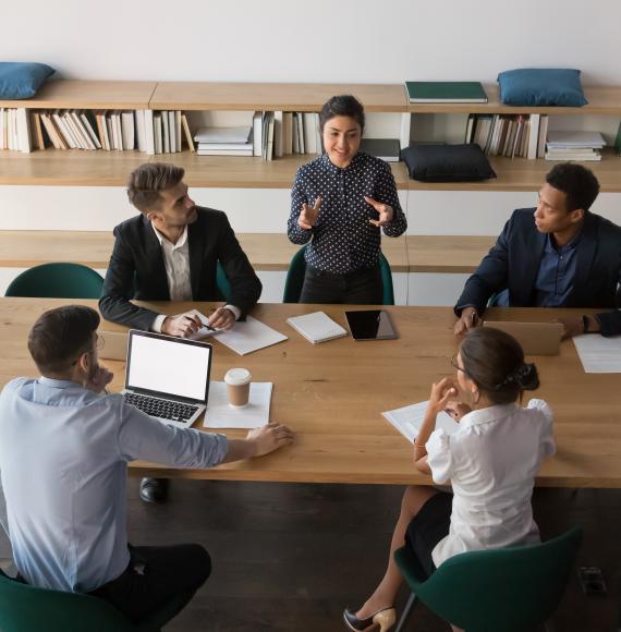 Group of people around a desk