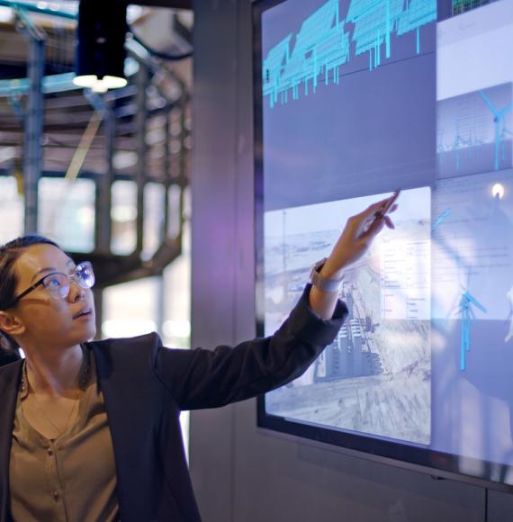 Woman using data in meeting