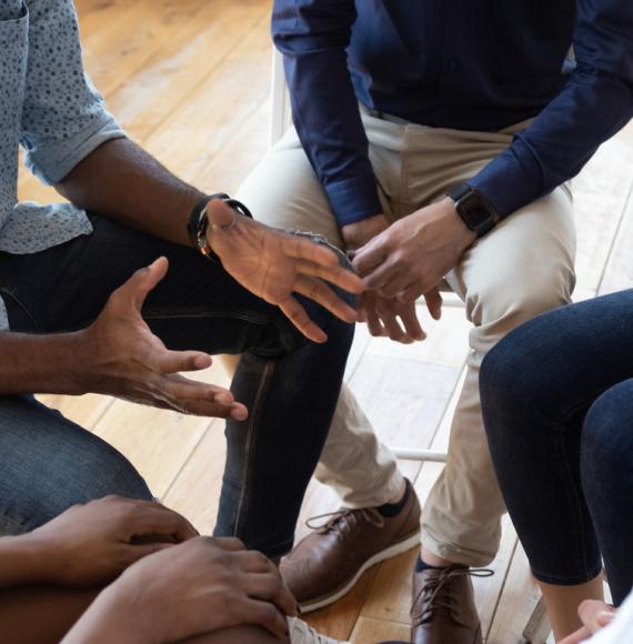 People being supported at a drug support group