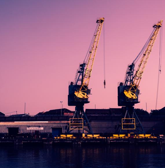 Two tall cranes on the banks of the River Wear in Sunderland, England.