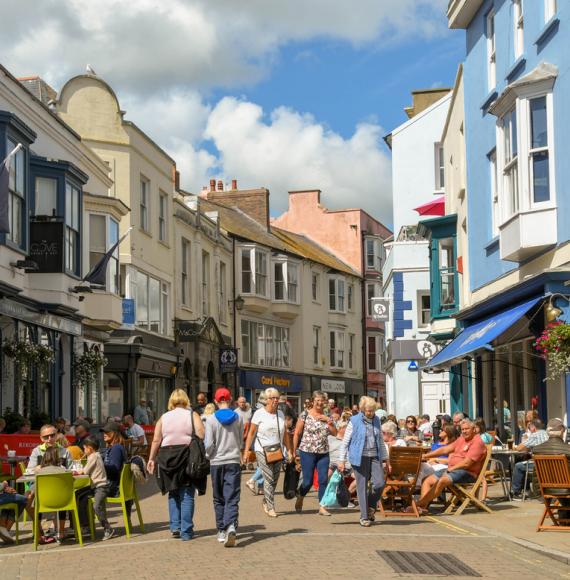 People on busy street in Tenby