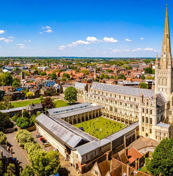 Aerial view of Norwich Cathedral located in Norwich, Norfolk, UK