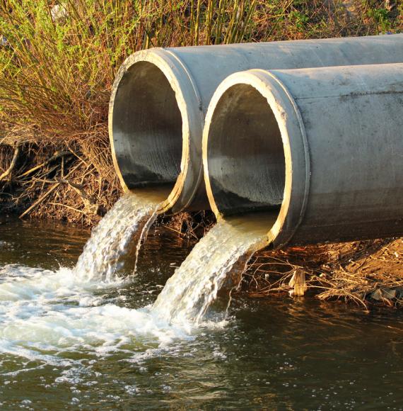 Discharge of sewage into a river