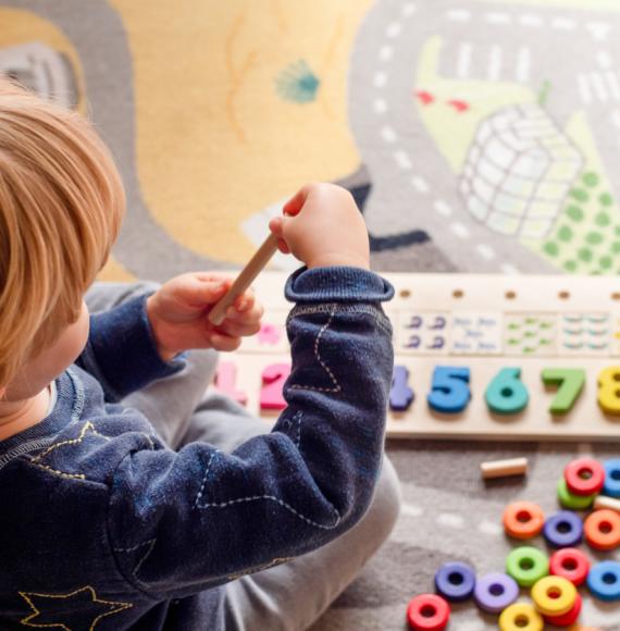 Child playing with toys