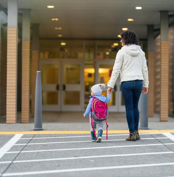 Woman walking with child