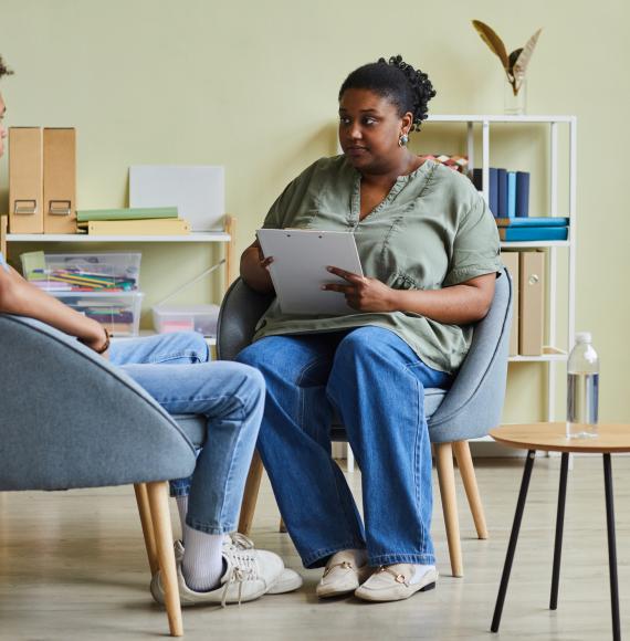 Healthcare worker with a young man