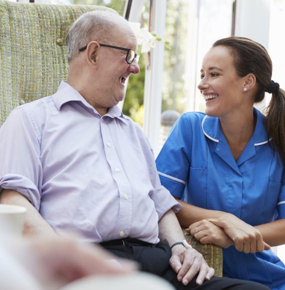 Carer sat with patient