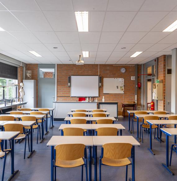 Shot from the back of an empty classroom in England