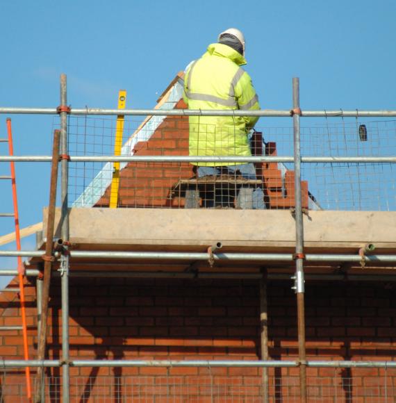 Man building a house