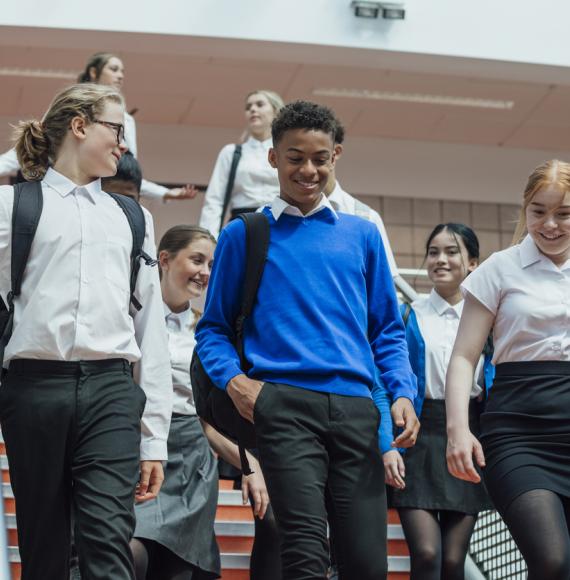 Three school children walking