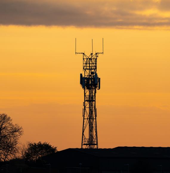5G tower at sunset