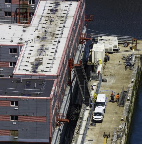 Bibby Stockholm barge from above docked on land