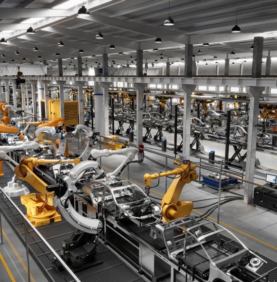 Cars on production line in factory