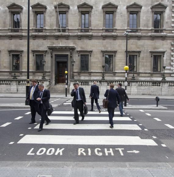 Civil servants crossing the road in London