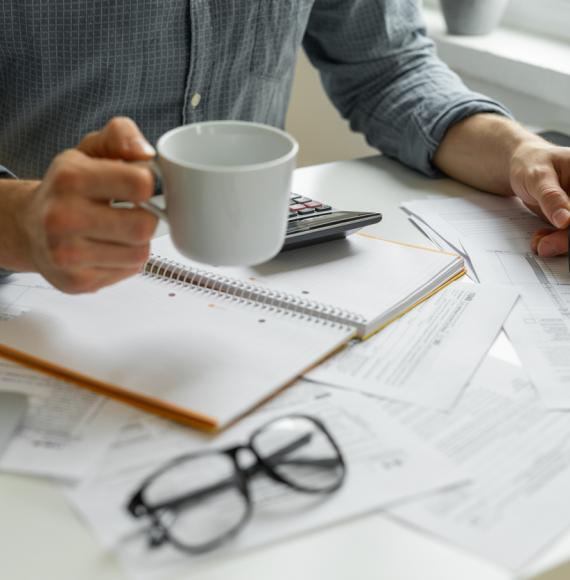 Man doing financial paperwork