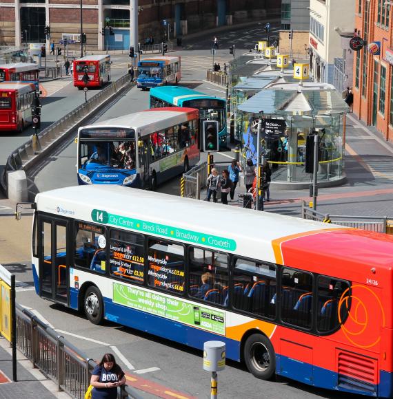 People ride StageCoach buses on in Liverpool, UK.