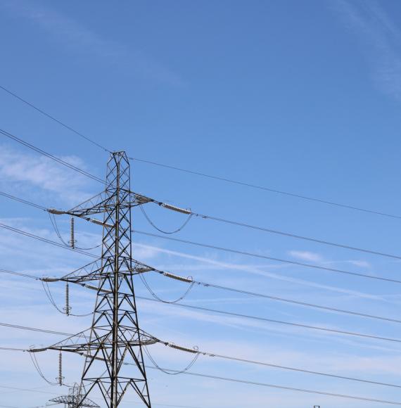 Broadband pylon against soft blue cloudy sky