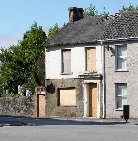 Typical UK terraced housing street derelict