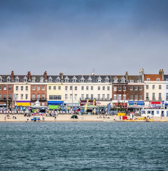 Crowded Weymouth Beach During Summer Days, UK