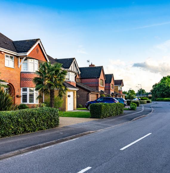 A street on a modern, brick built housing development in the UK