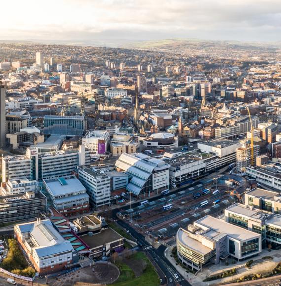 Aerial view of Sheffield city centre skyline at sunset