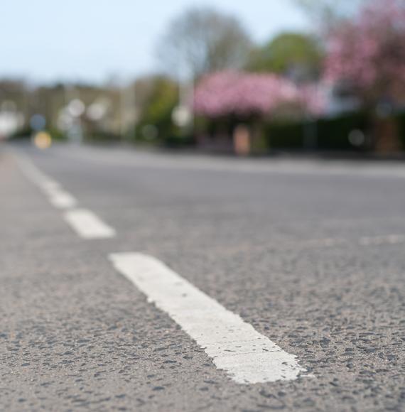 Road markings on an empty suburban road