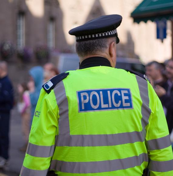 police at crowded street