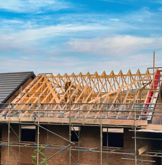 A new house on a construction site in Wales