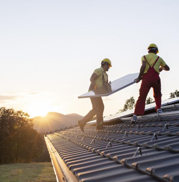 Shot of workers building a house