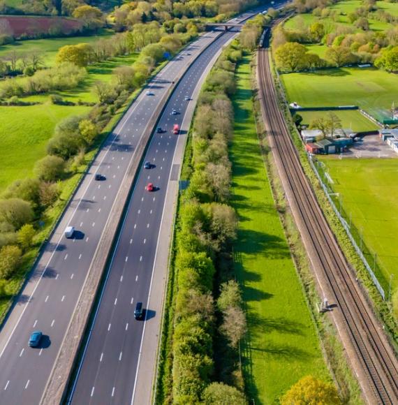 Aerial shot of the M5 motorway and a railway line